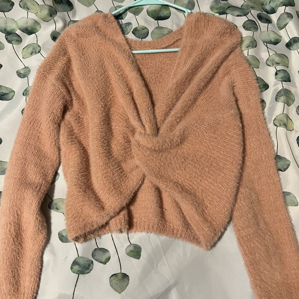 fluffy knot along sleeve